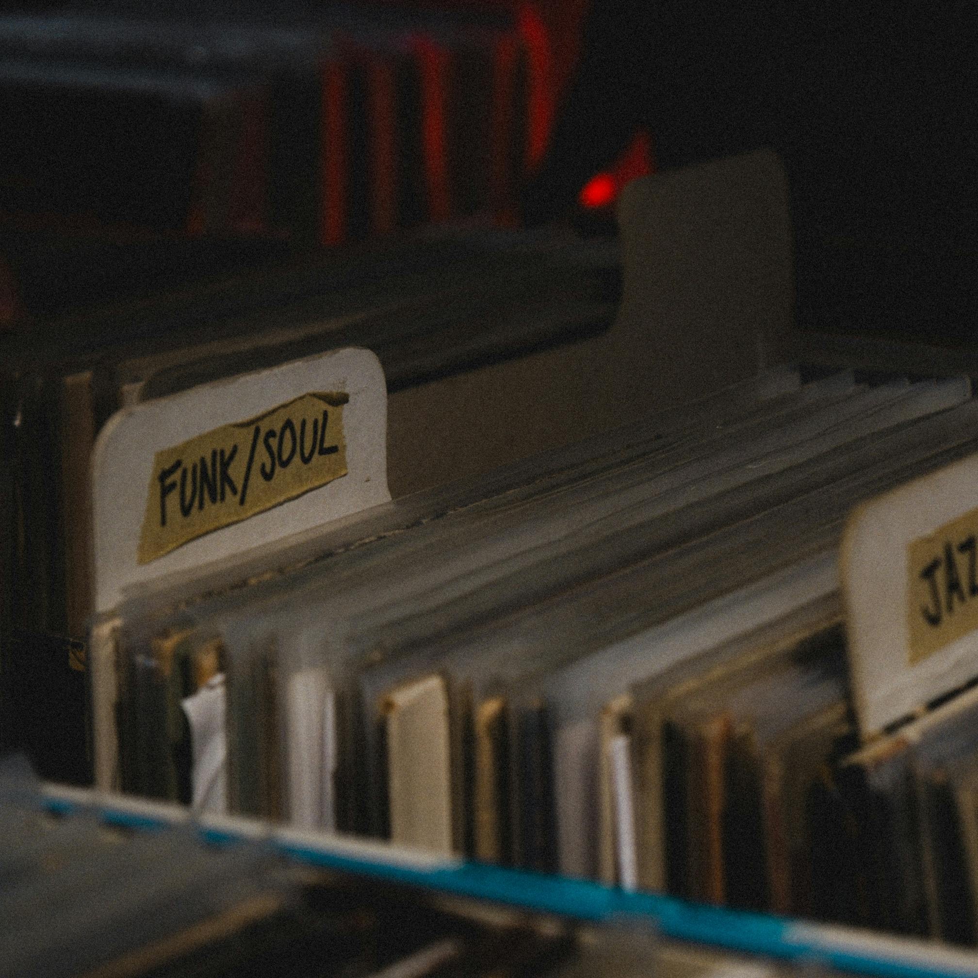 Vinyl albums in a box with the label funk on it.